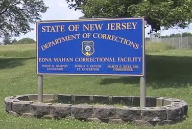Four more corrections officers, associate prison administrator, charged in assault cases at Edna Mahan Correctional Facility for Women