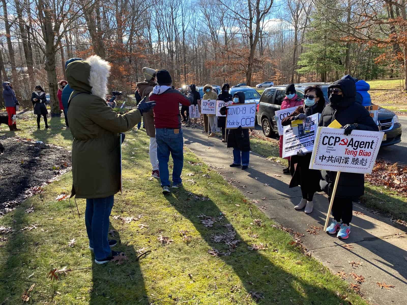 Supporters of Chinese dissident in West Windsor face off with protesters for second week